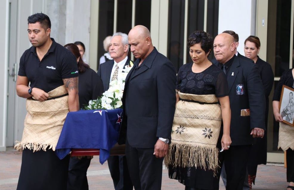 Bill Sevesi's family carries his coffin at his funeral in Auckland.