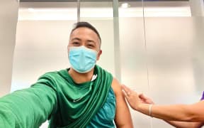 Prominent NZ-based Cook Islander Johnson Raela getting his Covid-19 jab.