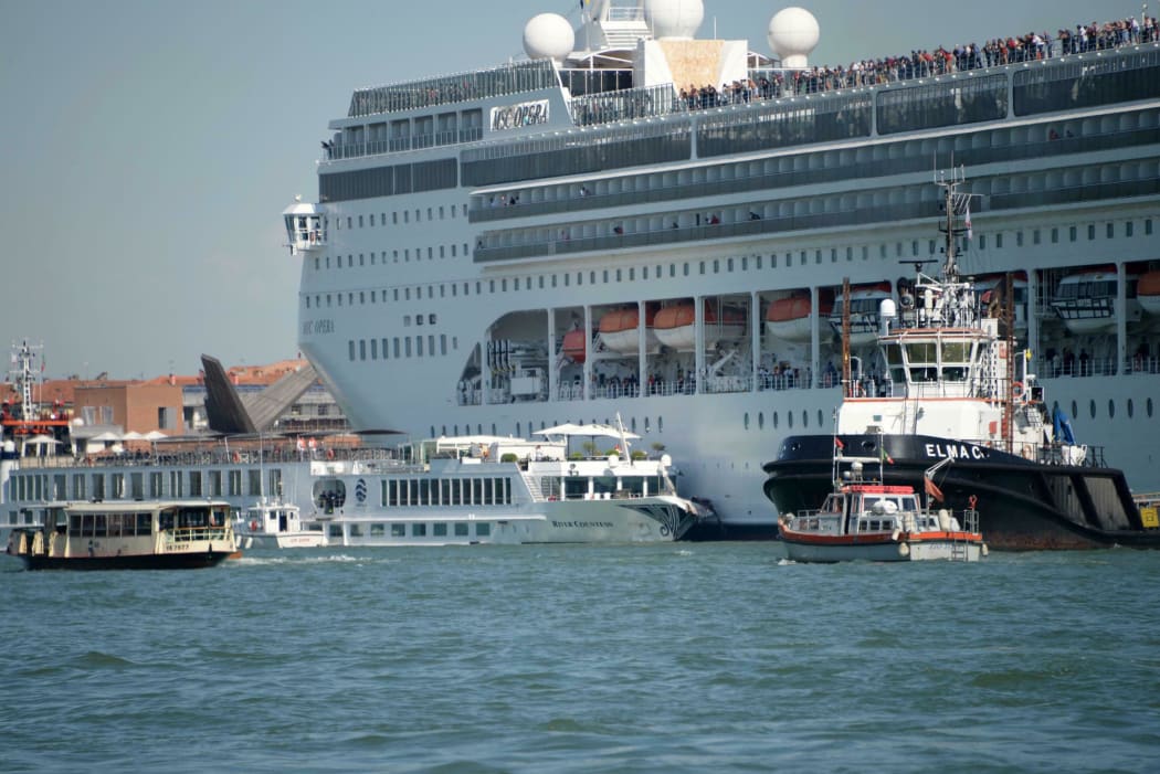 The MSC cruise ship Opera is seen after the collision with a tourist boat, in Venice, Italy, Sunday,  June 2, 2019.