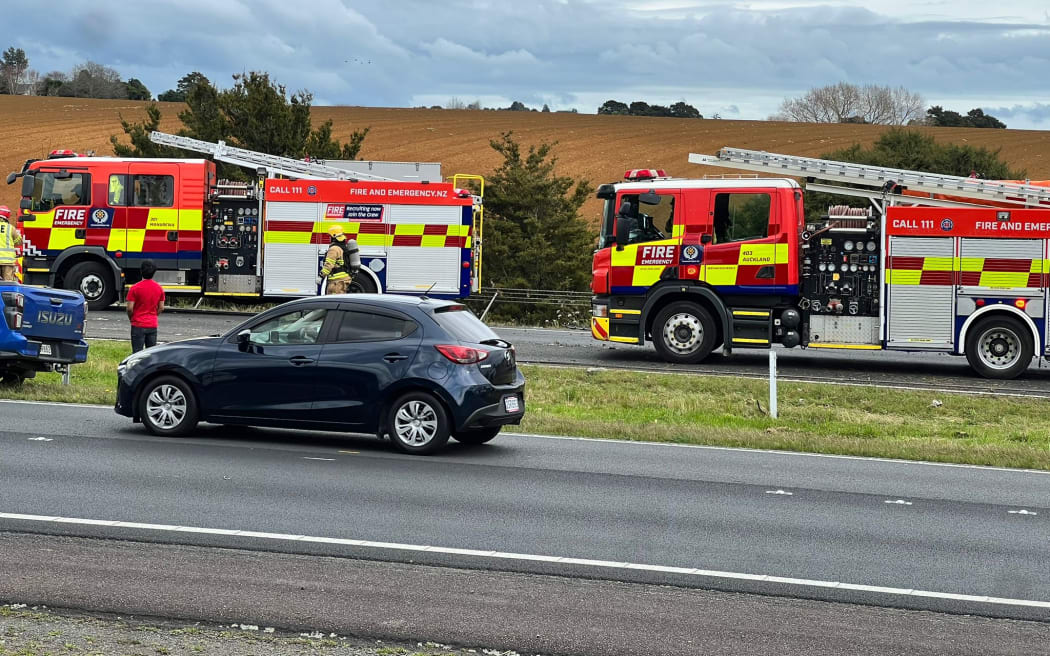 Emergency services at the scene of a horror crash on Auckland's State Highway 1 near Ramarama on 26 August 2024.