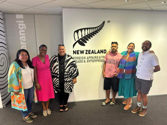 Samson Lee (standing third from left) spoke with Pacific Waves host Susana Suisuiki about the week-long fashion exchange supported by NZ's Ministry of Foreign Affairs and Trade. L - R: Fololeni Curr of MFAT, Heather Vakaosooso, Samson Lee, Ledua Daurewa, Felicity Bollen of MFAT and Aisea Solomone.