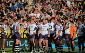 Dejected looking Scotland team after losing to the Kiwis