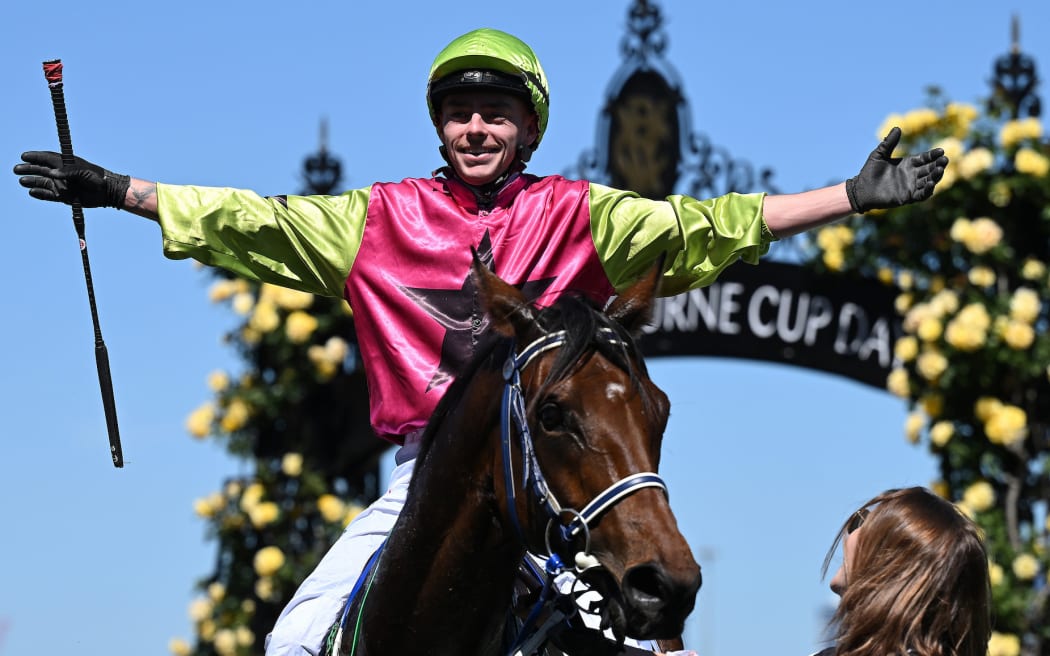 Jockey Robbie Dolan celebrates after riding Knights Choice to victory in the the 2024 Melbourne Cup at Flemington Racecourse.
