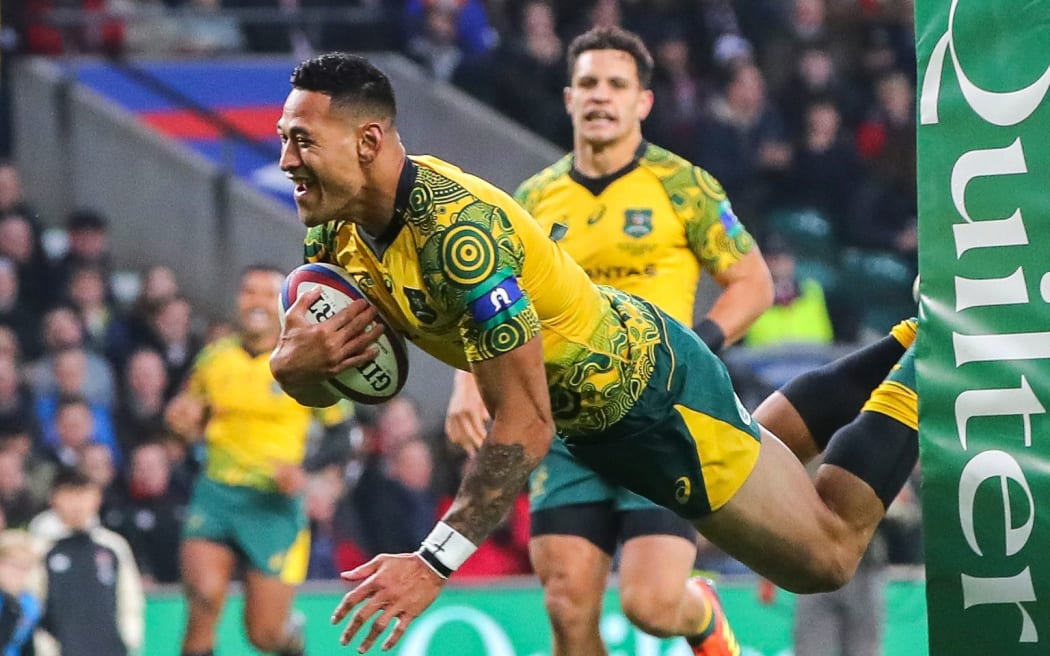 Australia's Israel Folau scores a try