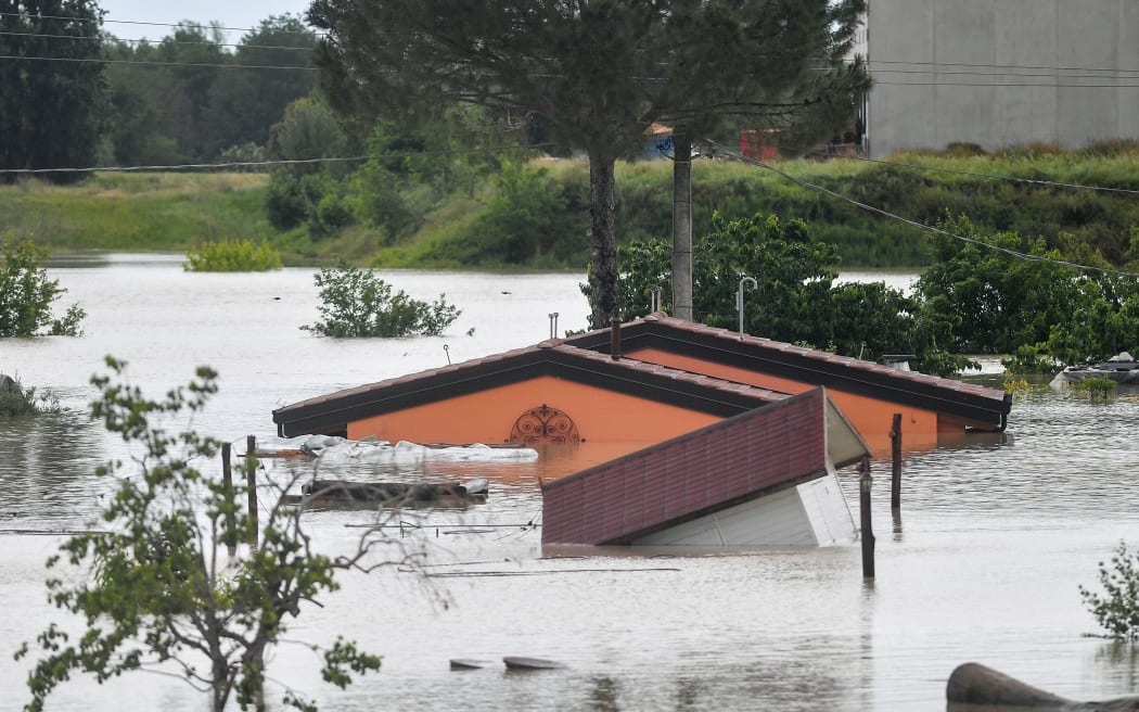 Flooded bungalows are pictured in Cesena on 17 May, 2023 after heavy rains caused major flooding in central Italy.