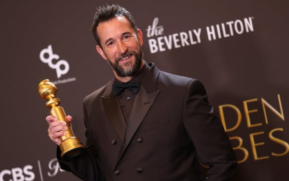 BEVERLY HILLS, CALIFORNIA - JANUARY 11: (FOR EDITORIAL USE ONLY) Noah Wyle, winner of the Best Performance by a Male Actor in a Television Series â€“ Drama award for "The Pitt," poses in the press room during the 83rd Annual Golden Globe Awards at The Beverly Hilton on January 11, 2026 in Beverly Hills, California. (Photo by John Shearer/WireImage)