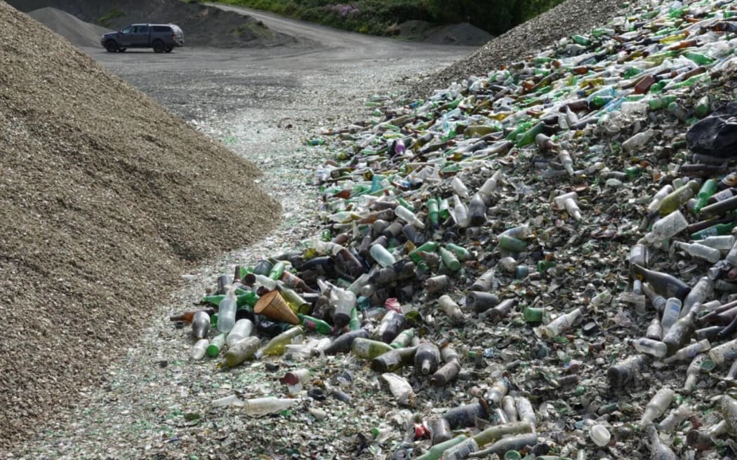Piles of glass and crushed glass at the quarry near Palmerston North.