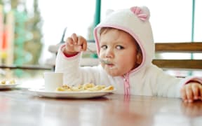 toddler in cafe