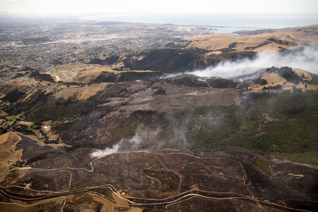 Firefighters a battling a 630 hectare fire in the Port Hills near Christchurch after it broke out on 14 February 2024. The fire remains uncontained and evacuations have taken place for nearby residents.