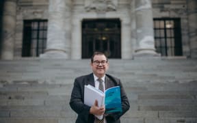 Grant Robertson holding the Budget 2020 ahead of its release.