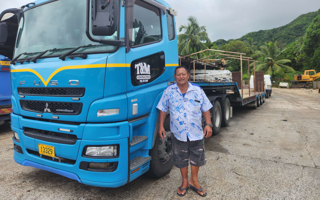 Cook Islands United Party Leader, Teariki Heather stands by one of his trucks he's preparing to take on the protest.