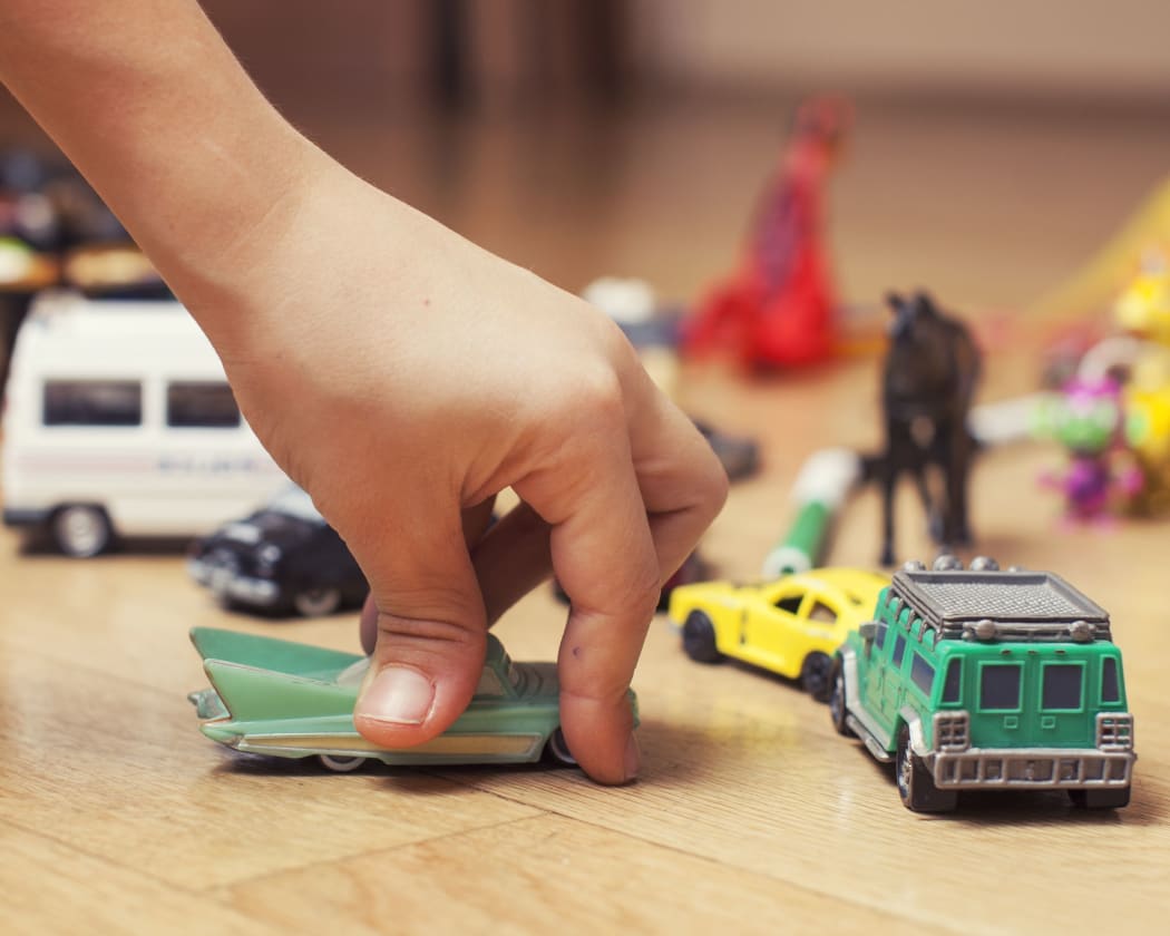 A child plays with toys at a kindergarten or early childcare centre.