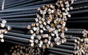 Steel rods or bars used to reinforce concrete (stock photo).