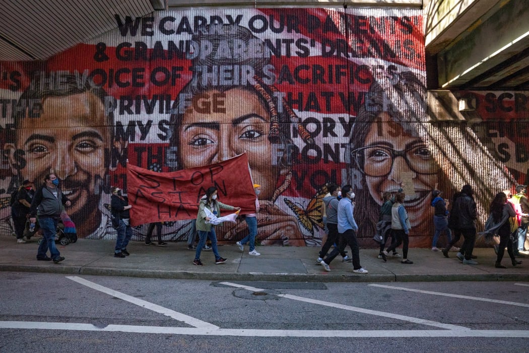 Marchers in Atlanta, showing support for the Asian community.