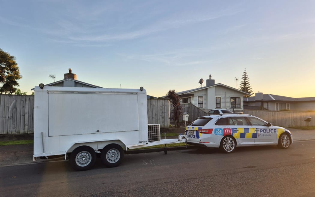 Police outside the Alexander Avenue home where a teenage boy was killed early on Sunday morning.
