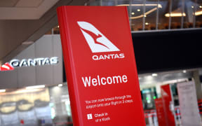 A general view shows the empty Qantas departure terminal at Melbourne Airport on August 20, 2020. -Qantas on August 20, 2020 posted an almost 2 billion USD annual loss due to the  pandemic.