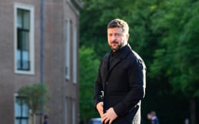 Ukrainian President Volodymyr Zelensky arrives for a social dinner at the 'Huis ten Bosch' Royal Palace during a North Atlantic Treaty Organization (NATO) Heads of State and Government summit in The Hague, on June 24, 2025. NATO leaders hold a two-day summit on June 24 and 25 in The Hague.