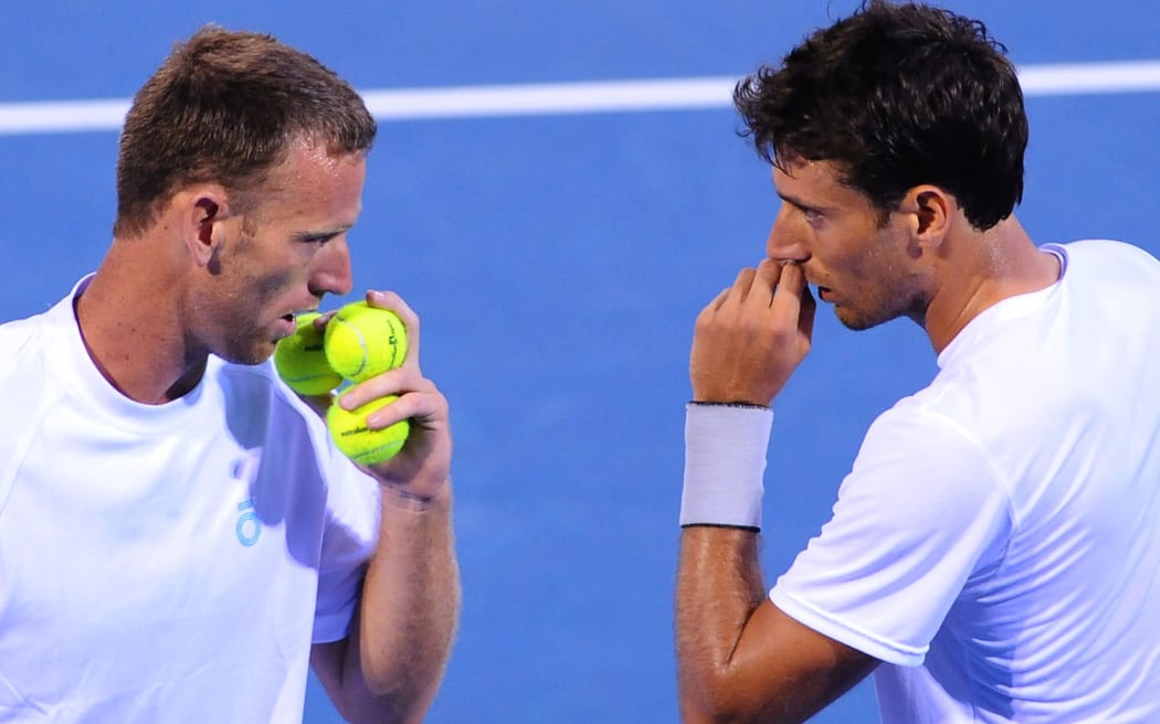 Michael Venus and Artem Sitak.