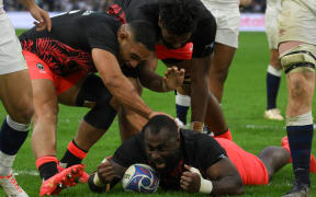 Fiji's prop Peni Ravai celebrates after scoring a try during the France 2023 Rugby World Cup quarter-final match between England and Fiji at the Velodrome stadium in Marseille, south-eastern France, on October 15, 2023.
