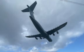 A US Air Force C-5M Super Galaxy landing at Auckland's Whenuapai air base on 7 September 2025.