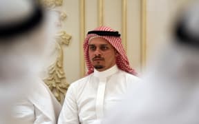 Salah Khashoggi, the son of murdered Saudi journalist Jamal Khashoggi, and his relatives receive mourners at an events hall in the Saudi coastal city of Jeddah on November 16, 2018.