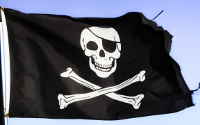 Skull and Crossbones flag flying