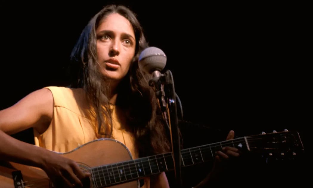 Joan Baez performing in concert in the 1960s from the documentary Joan Baez: I am a Noise