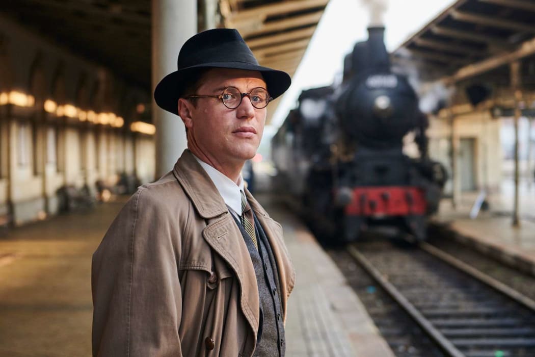 Still image from the 2023 drama film One Life featuring Johnny Flynn as the young Nicky Winton.