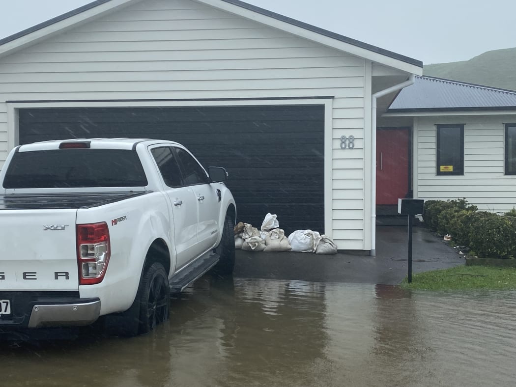 Sandbagged house at Sponge Bay, Gisborne