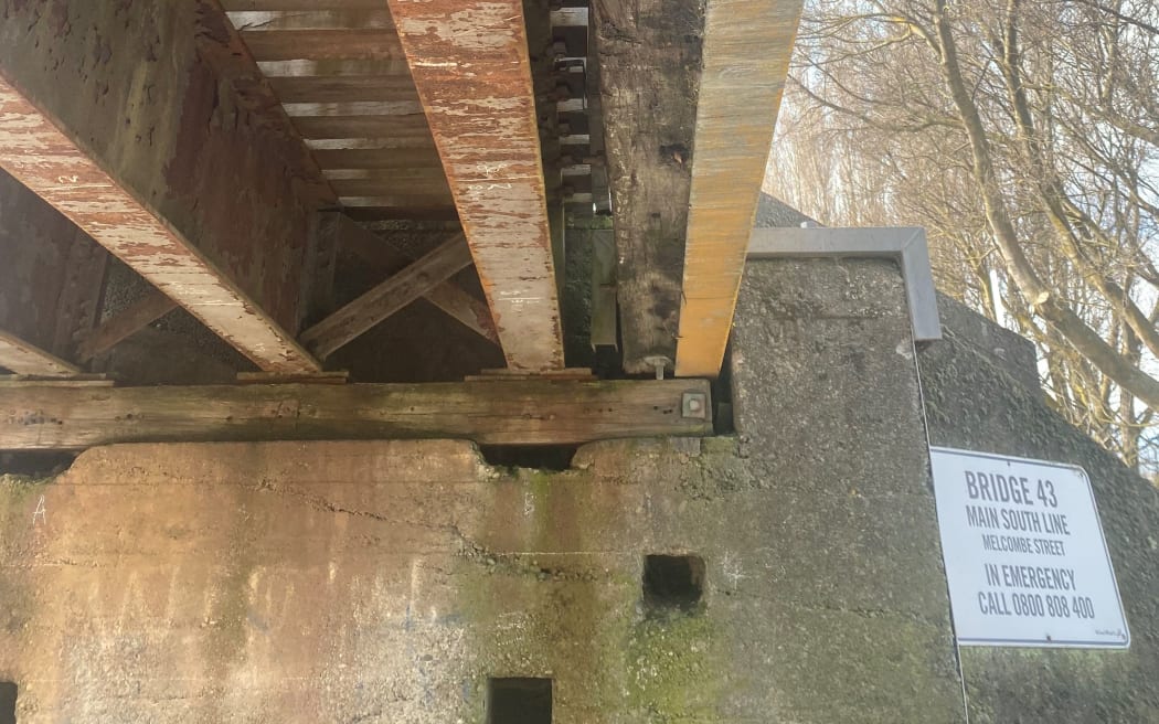 Cracking in the overhead impact beam.