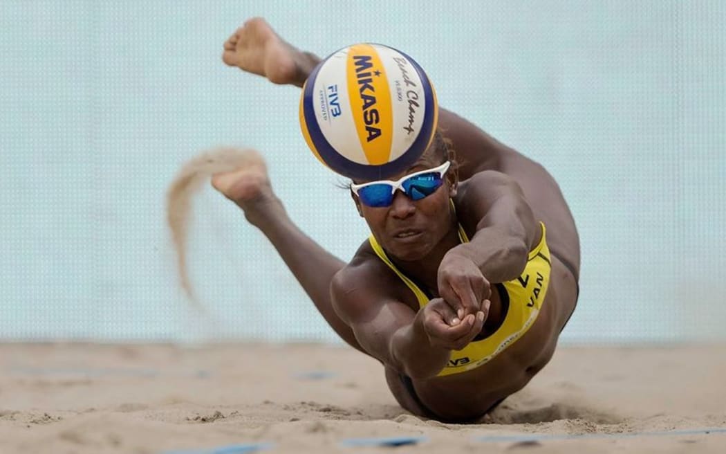 Vanuatu's Linline Matauatu in full flight against Brazil at the Beach Volleyball World Championships.