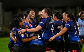 Maiakawanakaulani Roos (captain) of the Blues and Blues Women team celebrate a try from Cheyenne Tuli-Fale of the Blues, Blues Women v NSW Waratahs Women, Inaugural Women's Super Rugby Champions Final.