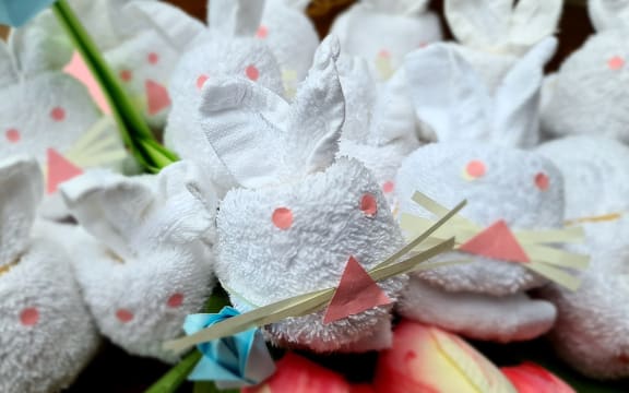 Easter bunnies made from face cloths in isolation hotels.
