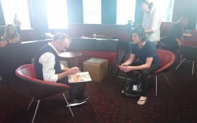 Danny Boyle signs Steve Newall's copy of the Trainspotting soundtrack