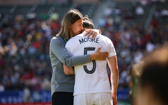 NZ Coach Jitka Klimkova consoles Meikayla Moore after the defender concede three own goals against the USA. 2022.