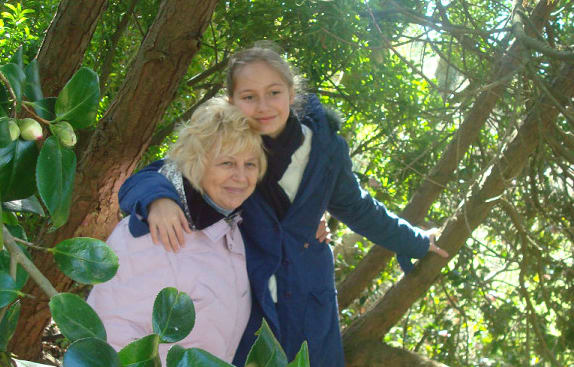 Inga Tokarenko with her grandmother in Ukraine several years ago.