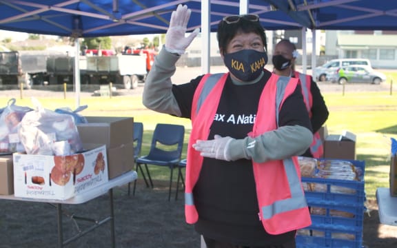 Whaea Lois Hawley-Simmonds, Rowandale School's Assistant Principal, helps distribute food parcels with vaccinations in Manurewa.