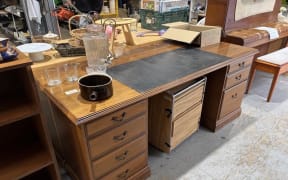 Furniture from the Wellington Town Hall for sale at the local tip shop.
