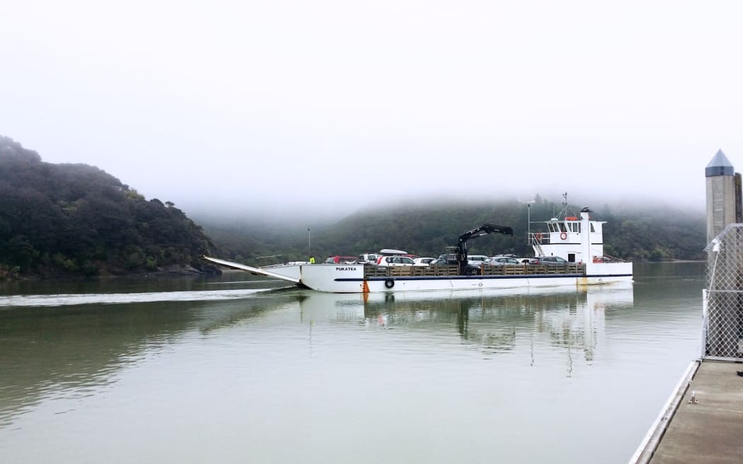 Holidaymakers and residents are rescued from Portage by barge after the July 2021 storm event damaged the road.