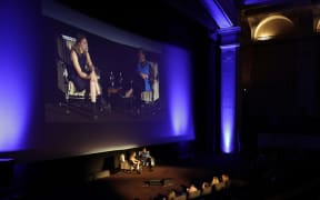 US whistleblower Chelsea Manning on stage and the big screen at the Embassy Theatre in Wellington.