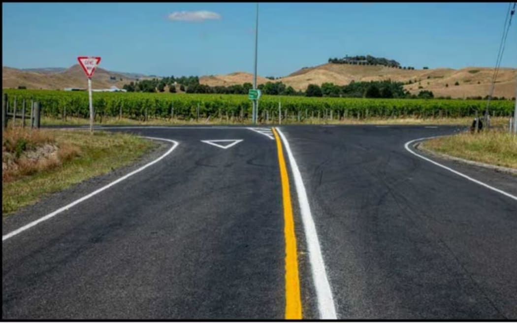 The intersection of Maraekakaho Rd and State Highway 50 after it had been repainted and remediated after the collision that claimed the life of Helen Poon.