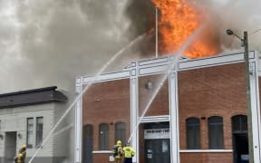 Firefighters fighting a blaze at the Roxburgh Town Hall on 6 February, 2024.