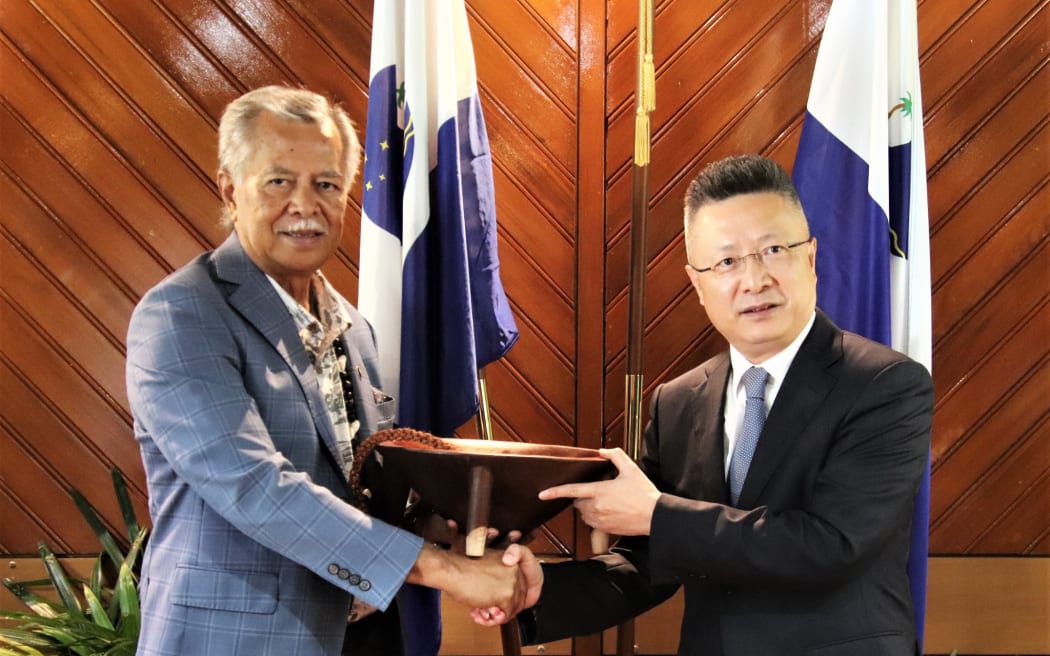 Pacific Islands Forum secretary-general Henry Puna, left, and China's Special Envoy for Pacific Island Countries Affairs Qian Bo.