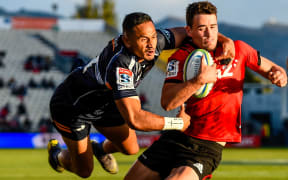 Will Jordan scores in the tackle of Toni Pulu