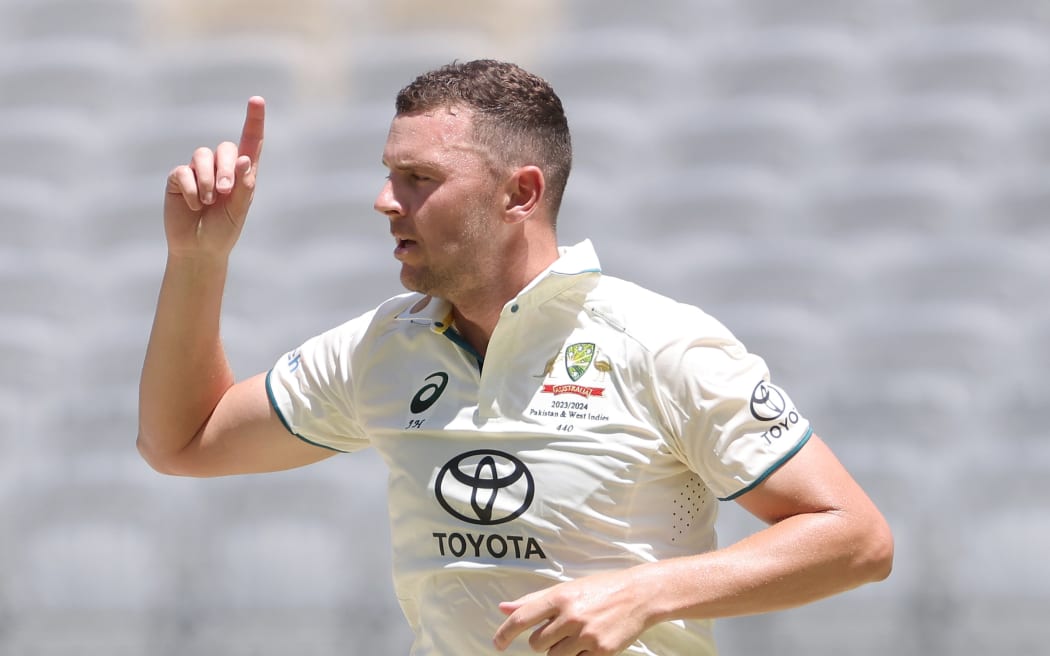 Josh Hazlewood of Australia celebrates after taking a wicket.