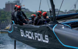 Peter Burling, co-CEO and driver of Black Foils SailGP Team, controls the wheel of the F50 catamaran whilst in action ahead of the Canada Sail Grand Prix in Halifax, Canada.