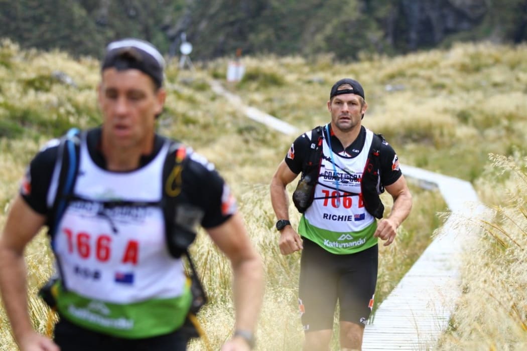 Richie McCaw and Rob Nichol on the Coast to Coast run