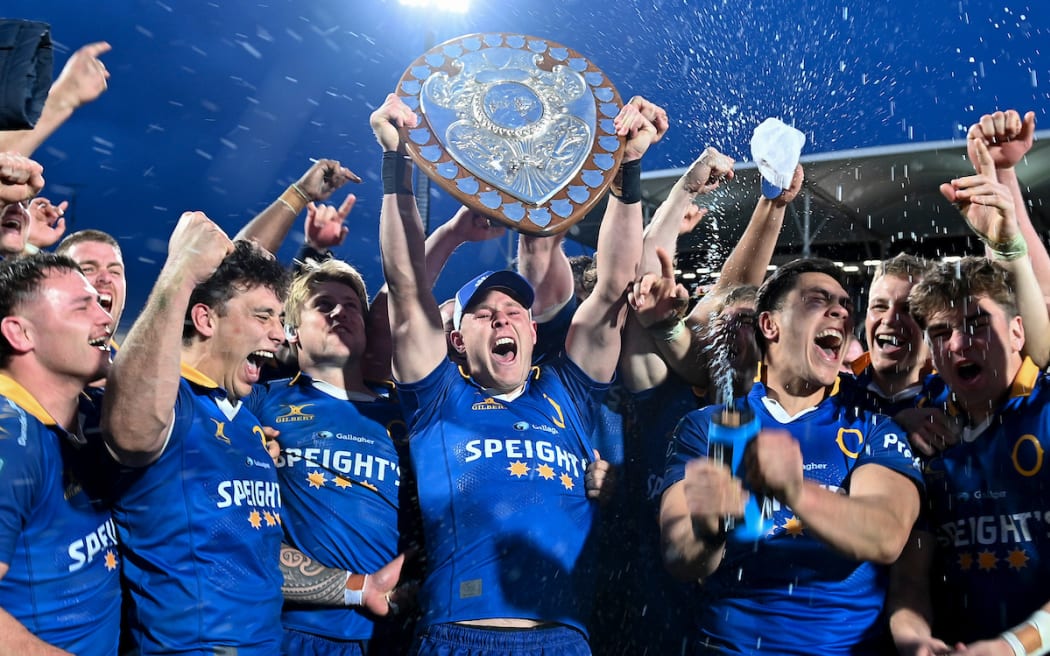 Sam Gilbert of Otago lifts the Ranfurly Shield.