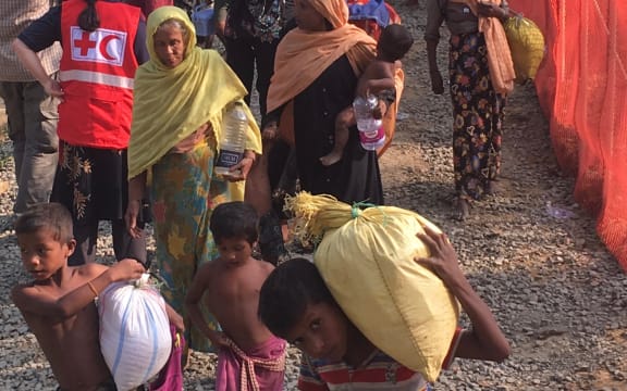Red Cross mobile medical teams continue to assist new arrivals from Myanmar at the transit camp in Bangladesh, where people are arriving by the thousands.
