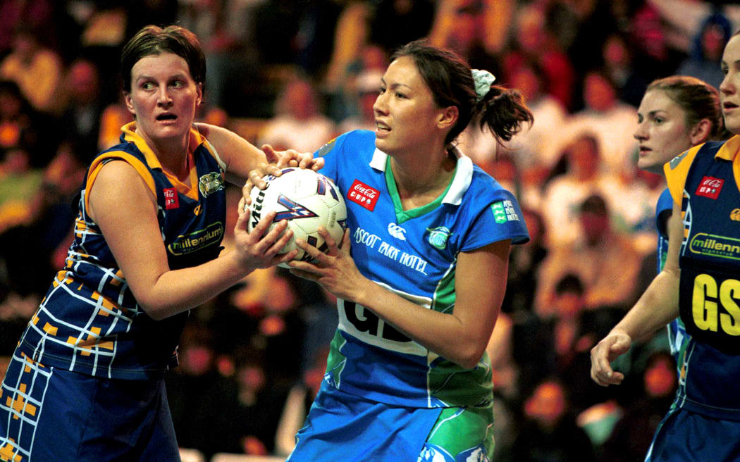 Stings Bernice Mene (right) and Belinda Colling (left) of the Rebels fight for the ball. Southern Sting v Otago Rebels, Coca-Cola Cup, National Netball Championships, 1999.